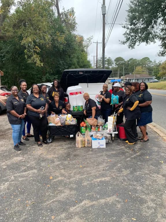 Volunteers serving meals